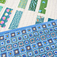 A Scrappy, Rainbow, Ruby Star Society Natalie Quilt