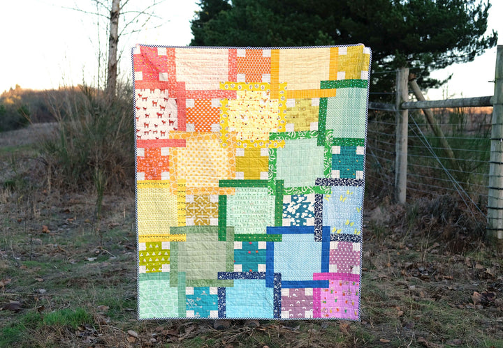 A Scrappy, Rainbow Judy Quilt