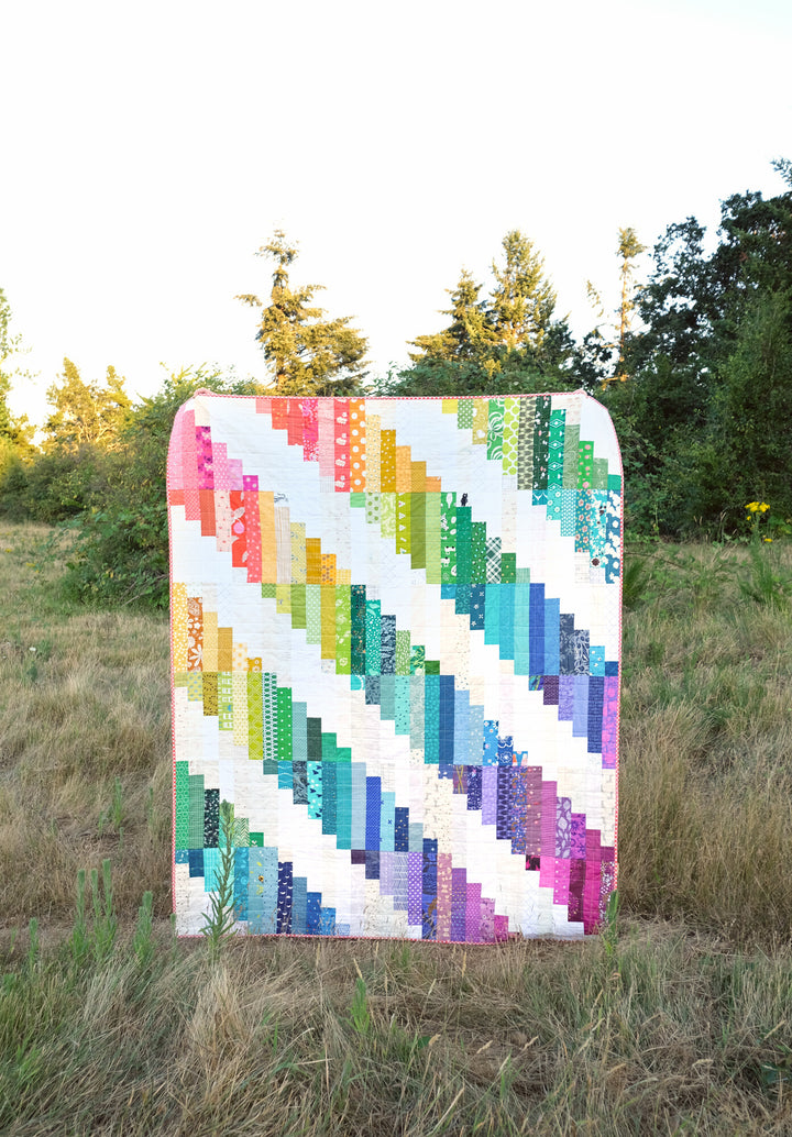 A Scrappy, Rainbow Luna Quilt