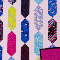 The Ori Quilt in Glow Garden