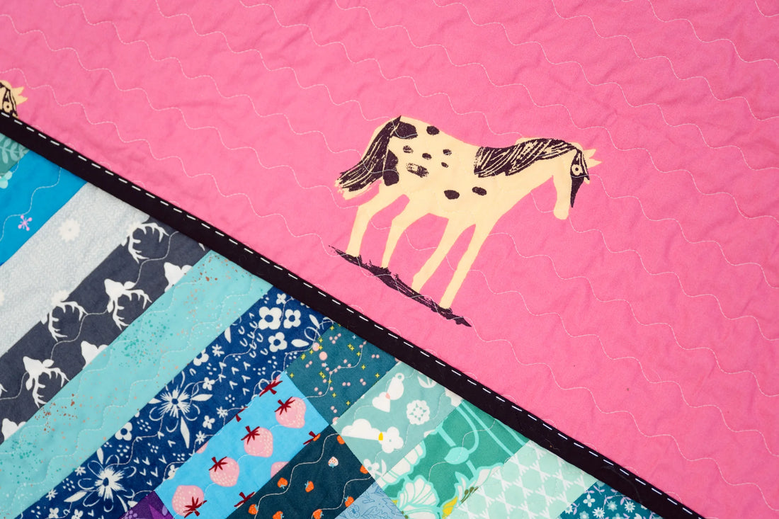 The Zora Quilt in a Rainbow of Scraps